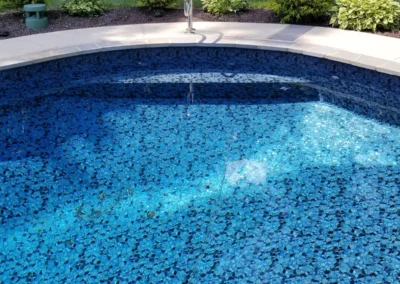 side view of a butterfly effect pattern pool with steps