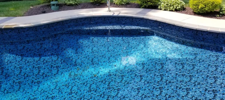 side view of a butterfly effect pattern pool with steps