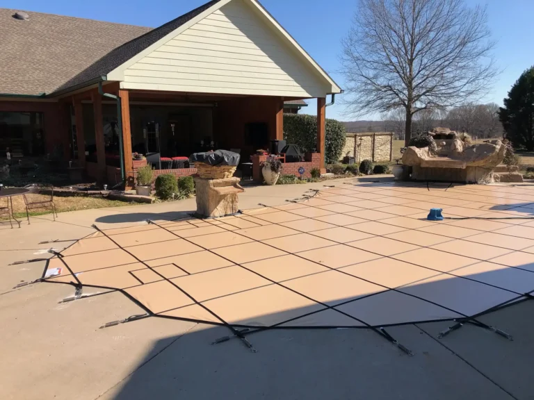 Tan Freeform Pool Cover with rock feature