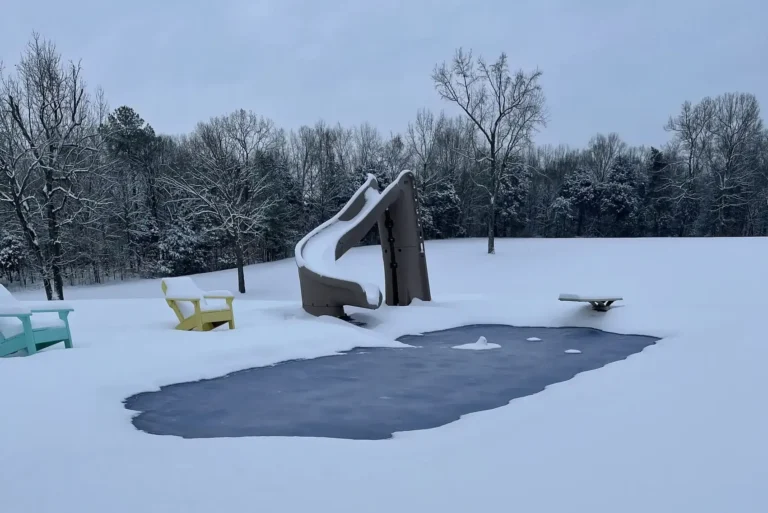 snow covered pool during the winter