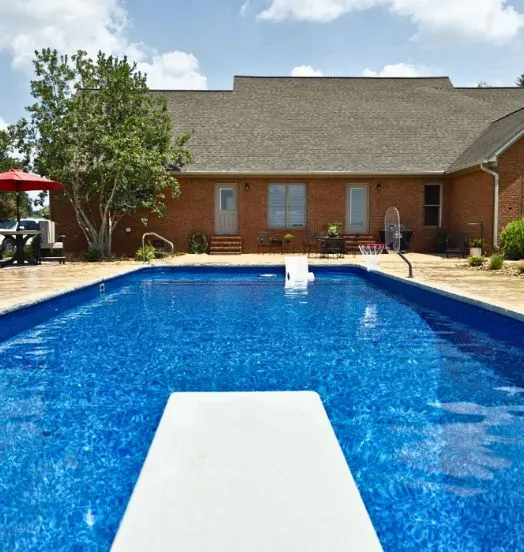 Diving board view of a rectangular pool with the Carolina Arctic pool liner pattern from Branded Manufacturing.