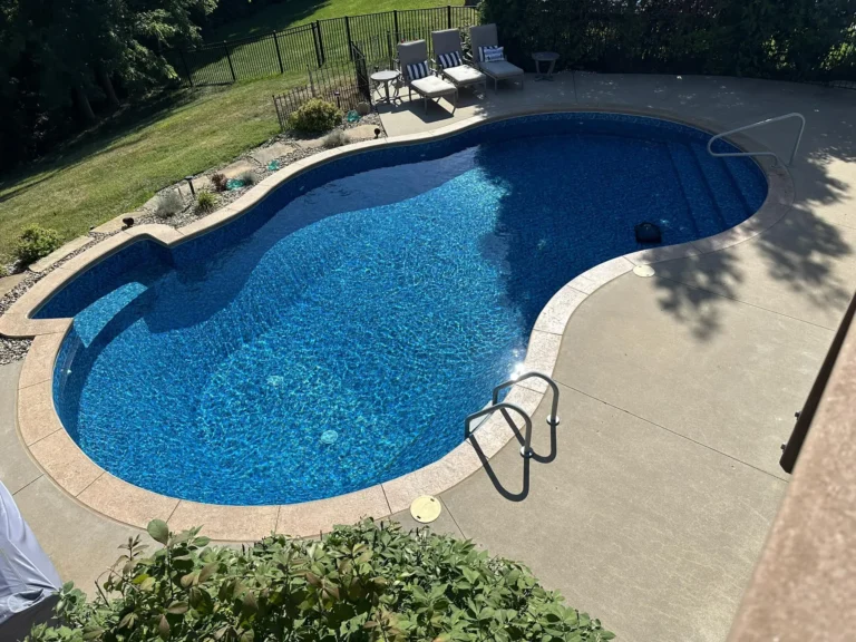 Freeform Pool with the Seaglass Liner just installed and filled with water