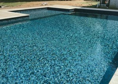 a beautiful rectangle pool with the Butterfly Effect liner