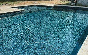 a beautiful rectangle pool with the Butterfly Effect liner