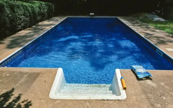 a beautiful rectangle pool with the Las Olas liner